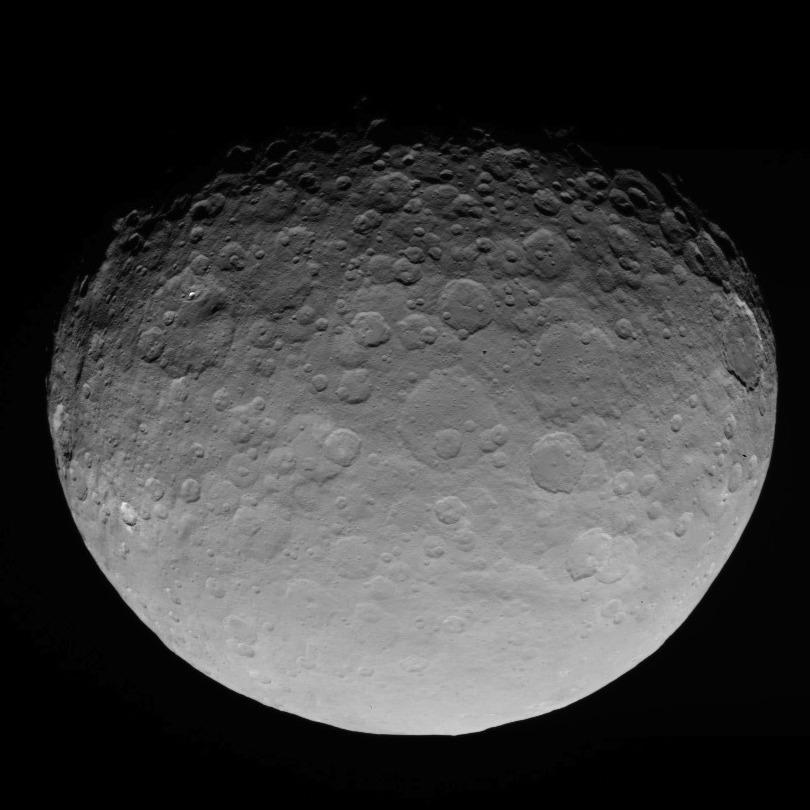 Graphite Found at Pluto Moon Charon and Dwarf Planet Ceres